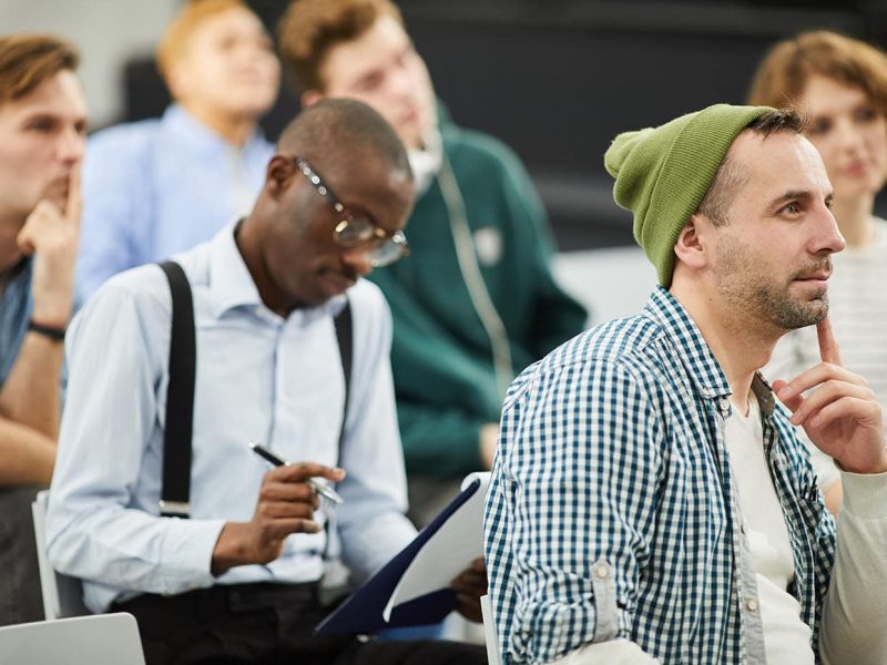 pensive-multiethnic-students-at-conference-FWY5MVU.jpg