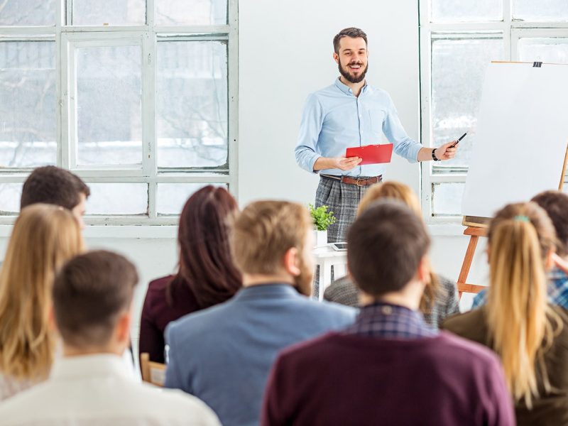 speaker-at-business-meeting-in-the-conference-hall-PKYTR89.jpg